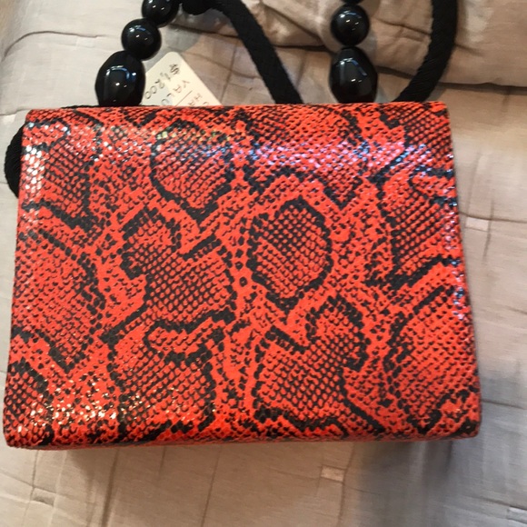 Embossed python calfskin handbag - Picture 9 of 9